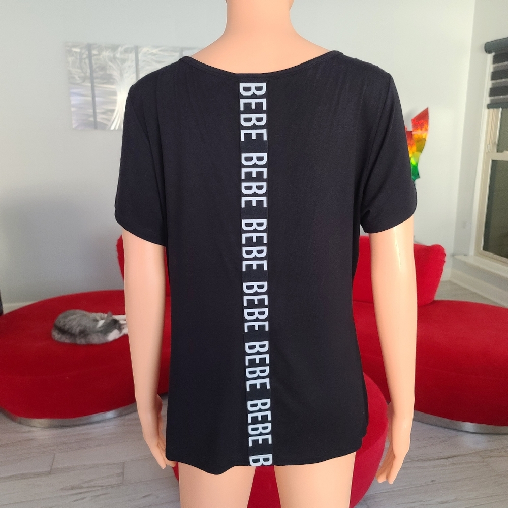 BEBE short sleeve black shirt top with logo vertically down back size L